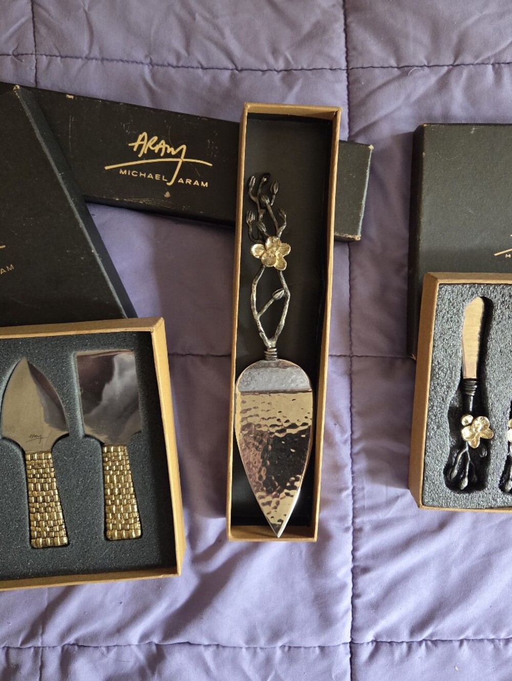 collection of 3 original, handcrafted Michael Aram luxury serveware sets.
